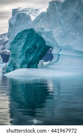 Iceberg in Greenland.  This iceberg has several ice caves.