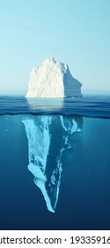 Iceberg - Hidden Danger And Global Warming Concept. Iceberg floating in the ocean with visible underwater part. Greenland Ice