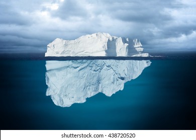 Iceberg Mostly Underwater Floating In Ocean