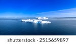 Iceberg seen from cruise ship vacation in Greenland coast in Arctic circle near Ilulissat Disko Bay.