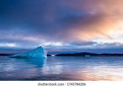 Iceberg At Sunset In The Disco Bay, Greenland. Their Source Is By The Jakobshavn Glacier. 