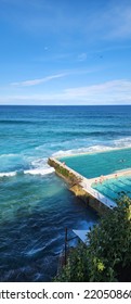 Iceberg Swimming Pool Located In Bondi Beach, Sydney NSW, Australia. Big Wave In The Blue Ocean. 