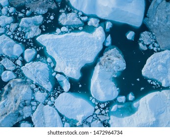 Icebergs Drone Aerial Image Top View - Climate Change And Global Warming. Icebergs From Melting Glacier In Icefjord In Ilulissat, Greenland. Arctic Nature Ice Landscape In Unesco World Heritage Site.