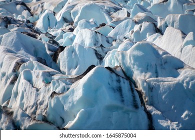 Icebergs Floating. Ices And Volcanic Ash. Glacier Lagoon Jokullsarlon. Big Ice Fall. South Coast Iceland. Volcanic Ash On The Ice. Big Glacier Melting Fast. Global Warming Concept. Arct Landscape. 