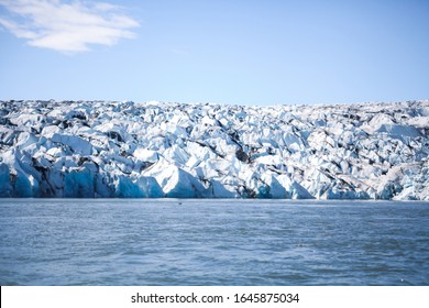 Icebergs Floating. Ices And Volcanic Ash. Glacier Lagoon Jokullsarlon. Big Ice Fall. South Coast Iceland. Volcanic Ash On The Ice. Big Glacier Melting Fast. Global Warming Concept. Arctic Landscape.