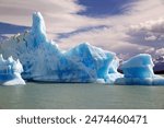 Icebergs from Upsala Glacier with amazing sky in the Argentino Lake, Argentina. Argentino Lake is the biggest freshwater lake in Argentina.