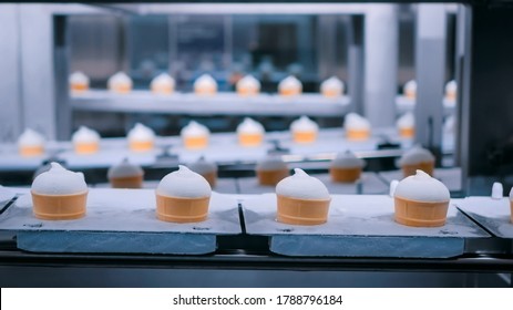 Icecream Automatic Production Line - Conveyor Belt With Ice Cream Cones At Modern Food Processing Factory. Food Dairy Industry, Manufacturing, Engineering And Automated Technology Equipment Concept