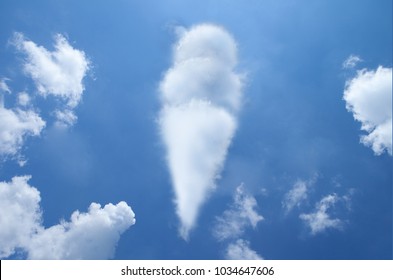 icecream cone cloud shape on blue sky.