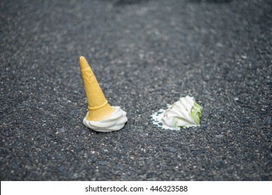 Ice-Cream corn green tea drop on the ground