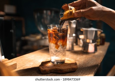 Iced Americano Coffee In A Glass On A Bar In A Cafe.