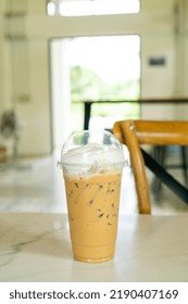 Iced Cappuccino Coffee Glass On Table In Coffee Shop Cafe