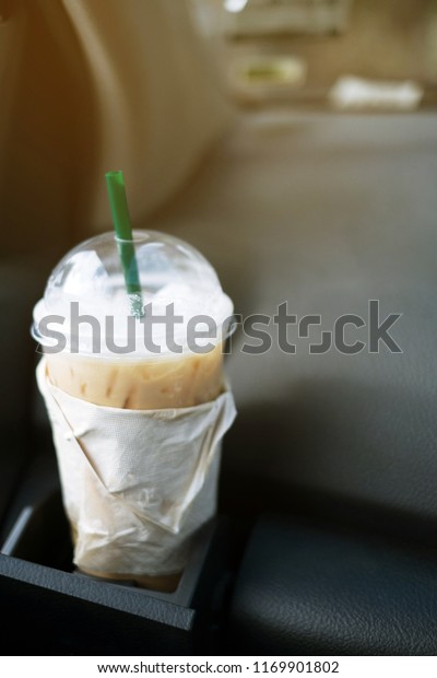 iced cappuccino\
coffee inside car cup\
holder