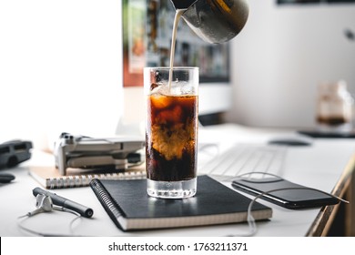 Iced Coffee In A Cup At The Computer Desk,Coffee On The Desk At Home