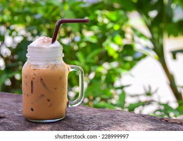 Iced Coffee In  Jug, Jar, Mug Glass Cups On The Table.