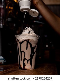 An Iced Coffee Or Mocha Frappe In A Rustic Coffee Shop.