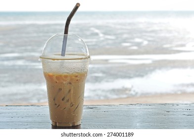 Iced Coffee On A Table Outside