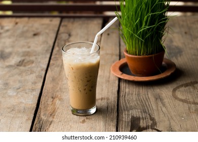 Iced Coffee On Wood Table