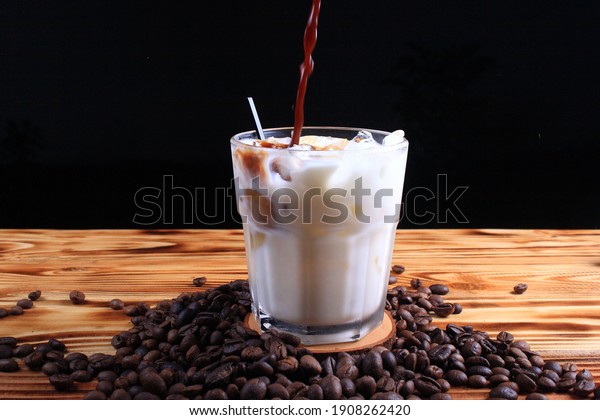 Iced coffee is a type of coffee beverage\
served chilled, brewed variously with the fundamental division\
being cold brew – brewing the coffee\
cold.