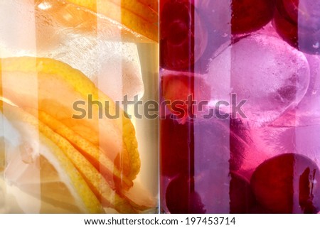 iced drinks with cherry and orange as background