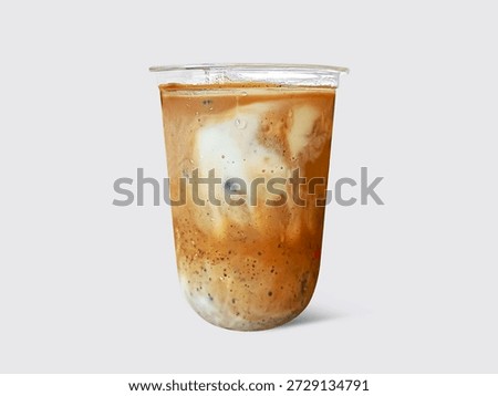 Iced latte in a regular plastic cup