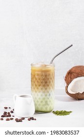 Iced Matcha Coffee With Coconut Milk And Ice On A White Background, Vertical