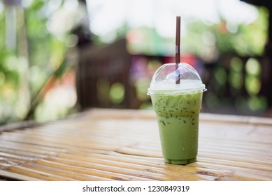 iced matcha green tea latte - Shutterstock ID 1230849319