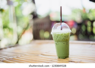iced matcha green tea latte - Shutterstock ID 1230849328
