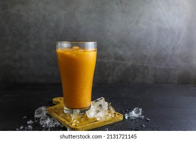 Iced Milk Tea In A Glass With Ice