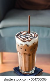 Iced Mocha Coffee In Glass On The Table