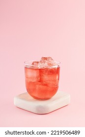 Iced pink chamomile omija drink. Refreshing camellia ice tea. Vertical orientation, copy space. - Shutterstock ID 2219506489