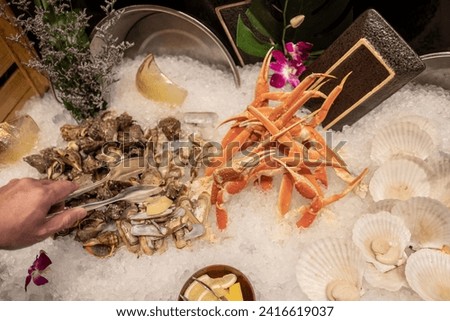 Iced seafood display, Snow Crab, Oyster, and scallops