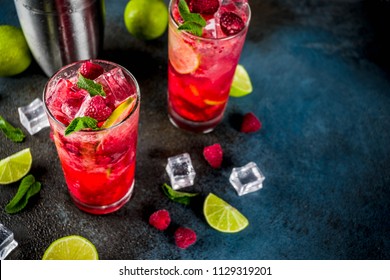 Iced Summer Drink Cocktail, Raspberry And Lime Lemonade With Fresh Mint And Lime, Dark Blue Rusty Background Copy Space