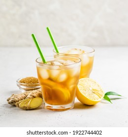 Iced tea with lemon, ginger and brown sugar in glasses. Space for text. - Powered by Shutterstock