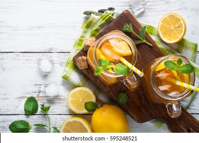 Iced tea with lemon. Refreshment cold summer drink. Top view.
