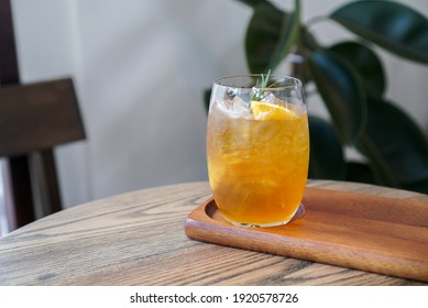 Iced Yuzu Citrus Tea. A Glass Of Yuzu Fruit Tea Topped With Sliced Orange.