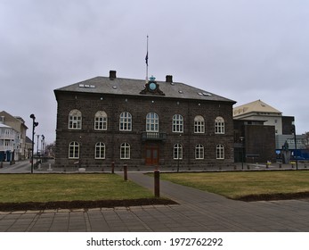 Reykjavík, Iceland - 04-02-2021: View Of Assembly Building Alþingishúsið Of The Icelandic Parliament Alþingi (also Allthing) Located At Austurvöllur Square In Reykjavik Downtown On Cloudy Winter Day.