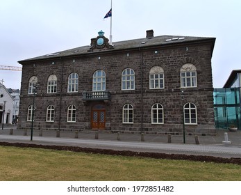 Reykjavík, Iceland - 04-02-2021: View Of Historic Parliament Building Alþingishúsið Of The Icelandic Alþingi (also Allthing) Located At Austurvöllur Square In Reykjavik Center On Cloudy Winter Day.