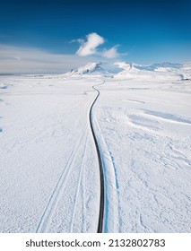 Iceland. Aerial View Of The Road. Winter Landscape From A Drone. Traveling Along The Golden Ring In Iceland By Car.