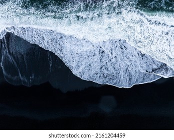 Iceland Black Sand Beach With Huge Waves At Reynisfjara Vik. Aerial Cinematic 4k Video. Beautiful Iceland Nature Coastline From Above.