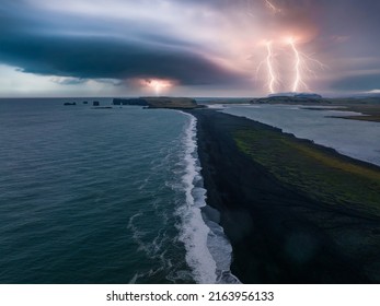 Iceland Black Sand Beach With Huge Waves At Reynisfjara Vik. Aerial Cinematic 4k Video. Beautiful Iceland Nature Coastline From Above.