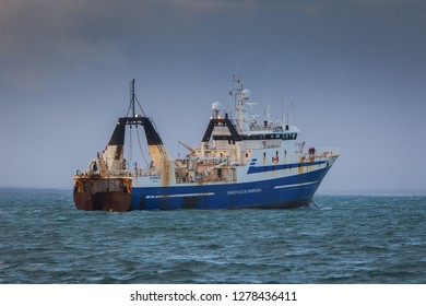 Iceland - February 15, 2012 : Factory Trawler Saputi Owned By The Qikiqtaaluk Corporation Sailing Near Shore Of South West Iceland.