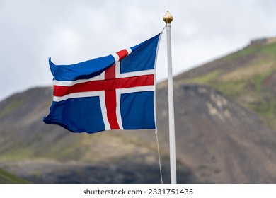 Iceland flag blowing in the wind on an overcast day