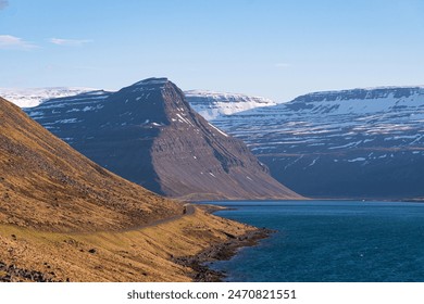 Iceland, Isafjordur route 61, road trip, summer evening, fjords, empty roads, iceland scenic route, snow, mountains and wilderness. Westfjords - Powered by Shutterstock