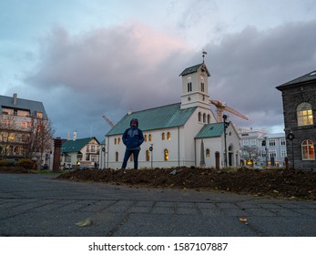 Reykjavík, Iceland - October 24 2019: View From The Public Square, Austurvöllur, With The Dómkirkjan Church In The Background. The City's Oldest Church.