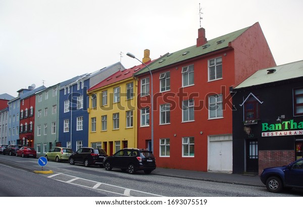 ICELAND, REYKJAVIK -\
JUNE 26, 2019: Gloomy summer day and a walk along the quiet streets\
with small cute houses