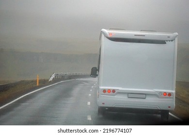 Iceland, Sudurland - August 8th, 2022 - White Camper, RV Driving On A Road