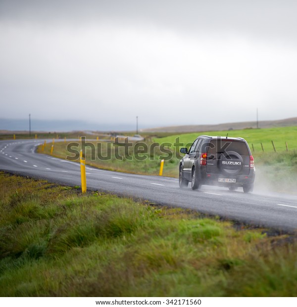 ICELAND-AUG\
27, 2015: Suzuki Grand Vitara car on the road in Iceland. Suzuki\
Motor Corporation is a Japanese multinational corporation\
headquartered in Minami-ku, Hamamatsu,\
Japan.