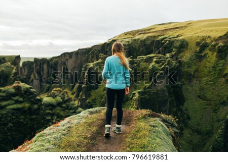Icelandic canyon. Woman in canyon. Freedom