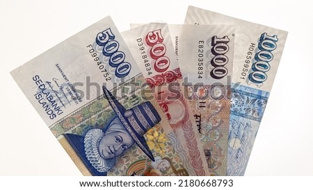 Icelandic cash. Money of Iceland. Several Icelandic krona bills on  white background. Icelandic krona is the national currency of Iceland (kronur), Thursday, March 10, 2022, 11:50.