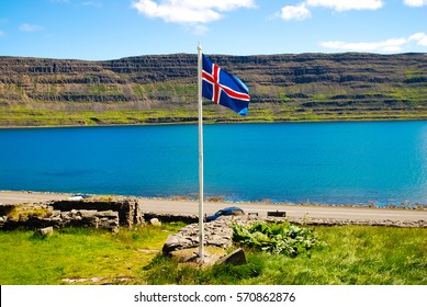Icelandic flag with fjord background